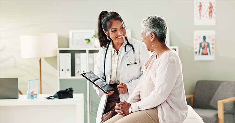 What to Look for in an EHR for Private Practice Female doctor with patient